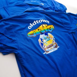 Photo of royal blue polo shirts with Old Town Car Wash branding